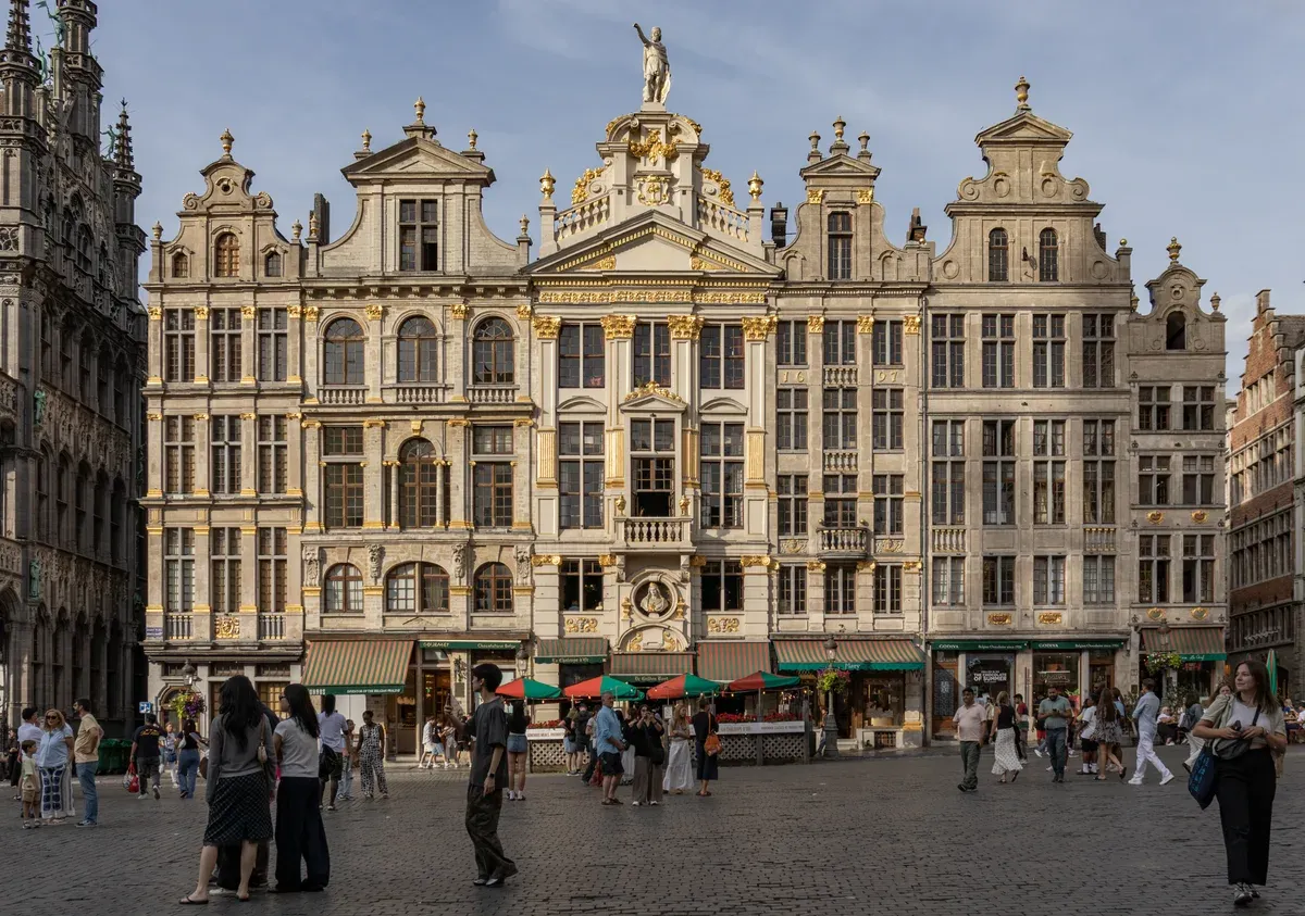 Baroque guildhouses on the Grand-Place where a chocolate walking tour in Brussels begins