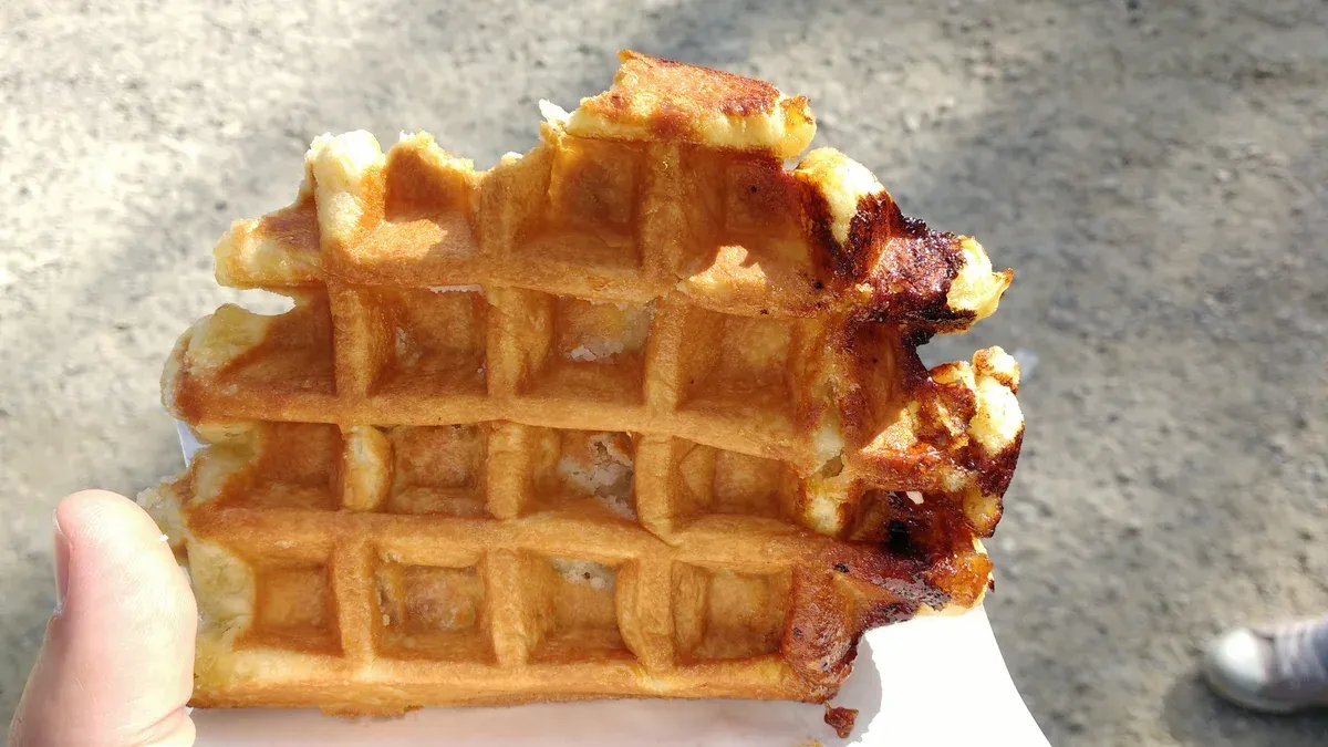 Liège waffle with caramelised sugar crust eaten in Brussels, often tasted on chocolate tours in Brussels